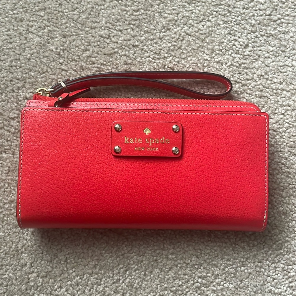 Red, Kate Spade clutch. In excellent condition.